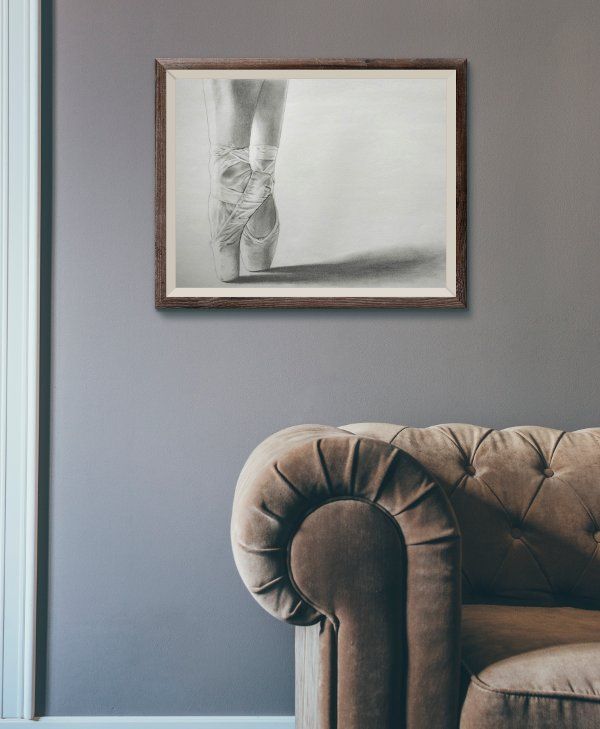 On Pointe graphite pencil drawing framed as living room decoration (mockup)